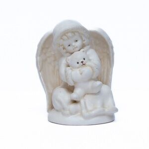 Russ Porcelain Angel holding Teddy Bear item# 101352